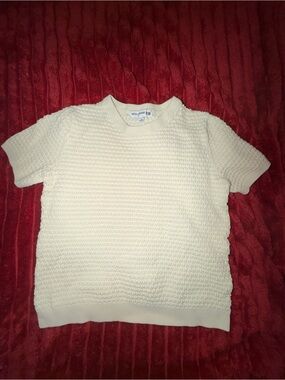 Uniqlo x Ines de la Fressange piece is a short-sleeved cotton knit pullover